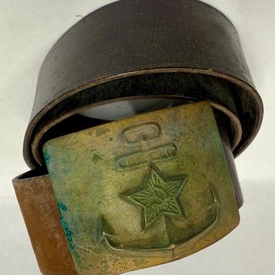 Sale Photo Thumbnail #30: Age unknown. Buckle has some green corrosion.  Belt was stored in a rolled-up manner, but is intact with no splits or fraying.