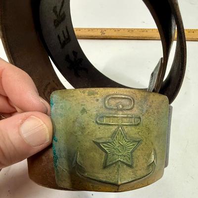 Sale Photo Thumbnail #34: Age unknown. Buckle has some green corrosion.  Belt was stored in a rolled-up manner, but is intact with no splits or fraying.