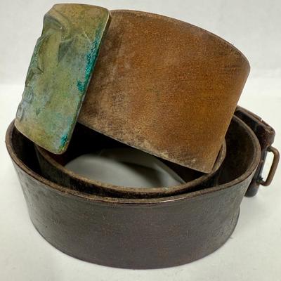 Sale Photo Thumbnail #39: Age unknown. Buckle has some green corrosion.  Belt was stored in a rolled-up manner, but is intact with no splits or fraying.