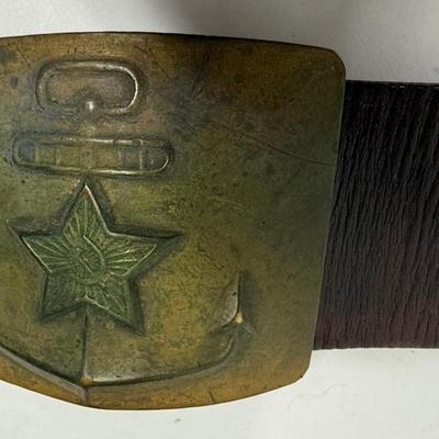 Sale Photo Thumbnail #35: Age unknown. Buckle has some green corrosion.  Belt was stored in a rolled-up manner, but is intact with no splits or fraying.