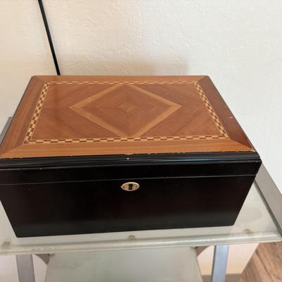 Sale Photo Thumbnail #119: Large wooden jewelry chest with compartments and drawers, includes assorted  jewelry and accessories.