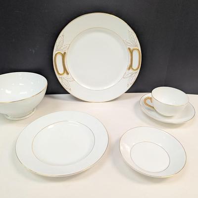 Sale Photo Thumbnail #911: 2 plates, 12 cups, 12 Saucers, 12 bowls, 1 serving bowl, 12 salad plates
