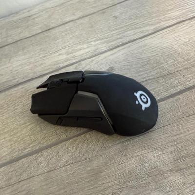 Sale Photo Thumbnail #148: Wireless SteelSeries gaming mouse with ergonomic design, excellent for PC gamers.