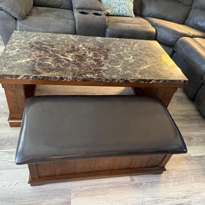 Sale Photo Thumbnail #150: Solid wood coffee table with brown marble-look top, comes with padded bench that tucks underneath.
