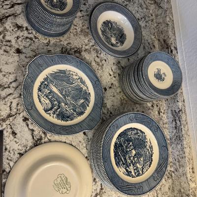 Sale Photo Thumbnail #183: Classic vintage Royal China Currier & Ives dinnerware set in the “The Old Grist Mill” pattern. Features detailed blue transferware scenes on white with beaded rims. This collectible set includes dinner plates, bowls, and side plates, offering both cha