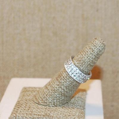 Size 6 Infinity Style Ring on a Silver Tone Band with 3 Rows of Clear Stones (3.7g)