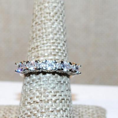 Size 7½ Row of 5 Clear Stones Ring on a Silver Tone Band (3.9g)