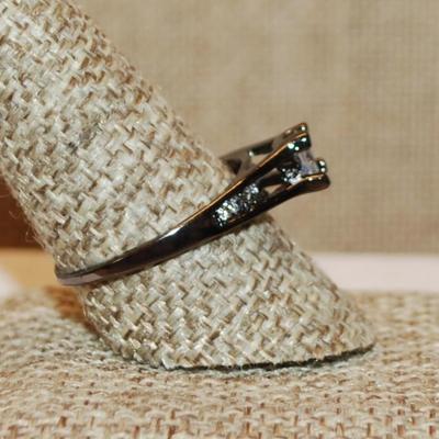 Size 10 High Rise Azure Cut 4 Prong Clear Main Stone & Side Accents on a BLACK Tone Band (2.6g)