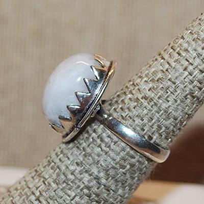 Size 7 Marked .925 SHARK TEETH Setting Holding an Opaque Oval White CABOCHON Gemstone Ring on a Silver-Plated Band (7.2g)