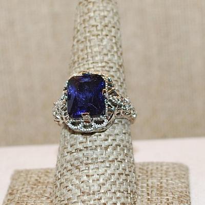 Size 8¼ Deep BLUE Rectangle Stone Ring on a "Spider Web" Nest & Surround on a Silver Tone Band (3.9g)