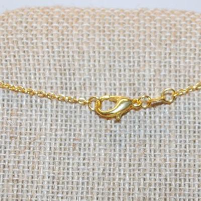 Graphic Designed Flowery PENDANT (2" x ¾") with 10 Larger Round Clear Stones on a Gold Tone Necklace Chain 18" L