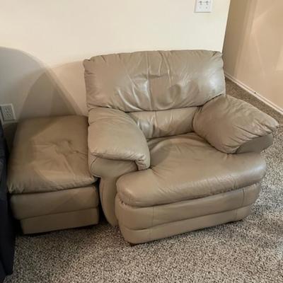 Sale Photo Thumbnail #9: Comfortable, stuffed leather chair with ottoman.