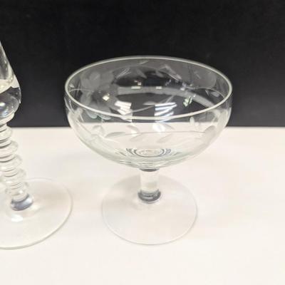 Sale Photo Thumbnail #1067: Clear Glass Braided Stem Glass & Etched Floral Champagne Glasses