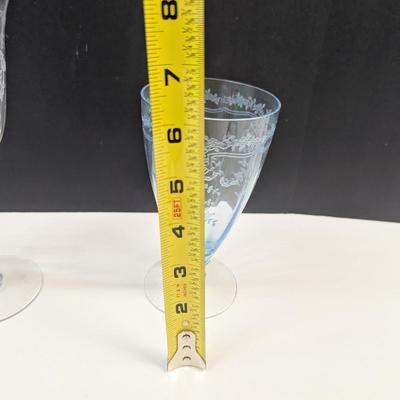 Sale Photo Thumbnail #1075: 6 clear glasses & 4 Blue glasses
Some do have chips