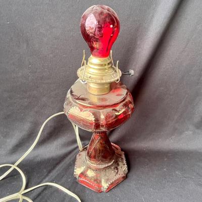 Lot 87 Ruby flashed hearts oil lamp