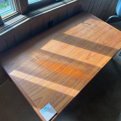 Sale Photo Thumbnail #105: Not Veneer. Solid Top. 47” long x 25 1/2” wide x 16” tall. Ring / Stain in one corner. Could be removed. All pieces are solid teak. Stamped Denmark on bottom. Unknown maker