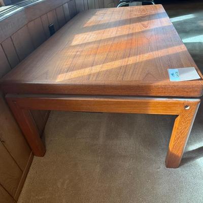 Sale Photo Thumbnail #106: Not Veneer. Solid Top. 47” long x 25 1/2” wide x 16” tall. Ring / Stain in one corner. Could be removed. All pieces are solid teak. Stamped Denmark on bottom. Unknown maker