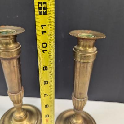 Sale Photo Thumbnail #1236: Pair Of Solid Brass Candlesticks