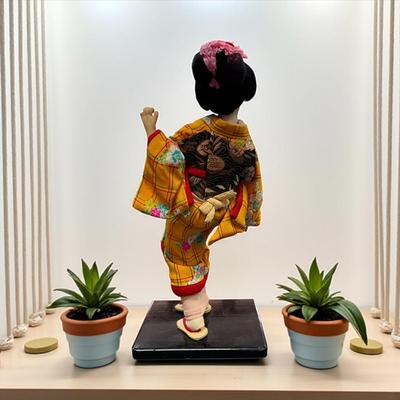 Sale Photo Thumbnail #662: Japanese Geisha or Maiko Doll..  Nihon Ningyo dressed in a vibrant kimono   13" Tall  on a wooden base