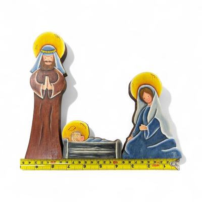 Sale Photo Thumbnail #673: Wooden Hand Painted Nativity Scene with Mary, Joseph and Baby Jesus.   Signed by the Artist