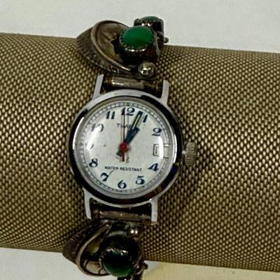 Sale Photo Thumbnail #141: Watch seems damaged, cannot wind it or set the hands.  Two large portions are made from Coin Silver (CS = 90%),  Total watch weight is 32.6g.