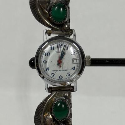 Sale Photo Thumbnail #140: Watch seems damaged, cannot wind it or set the hands.  Two large portions are made from Coin Silver (CS = 90%),  Total watch weight is 32.6g.