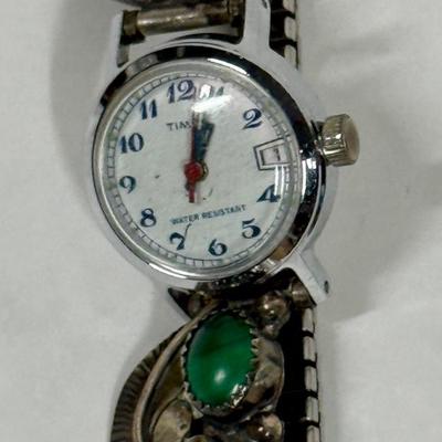 Sale Photo Thumbnail #146: Watch seems damaged, cannot wind it or set the hands.  Two large portions are made from Coin Silver (CS = 90%),  Total watch weight is 32.6g.