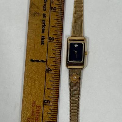 Sale Photo Thumbnail #15: Quartz Water Resistant watch, not running (most likely needs a new battery). Very nice band, watch is in very good physical condition. Stem pulls out and hands can be set.