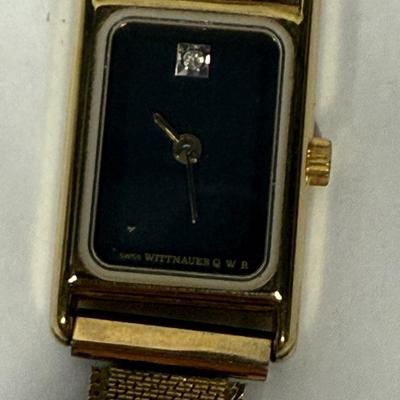 Sale Photo Thumbnail #19: Quartz Water Resistant watch, not running (most likely needs a new battery). Very nice band, watch is in very good physical condition. Stem pulls out and hands can be set.