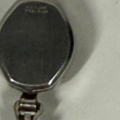 Sale Photo Thumbnail #25: Hands can be set, but watch cannot be wound.  Does not appear to be running.