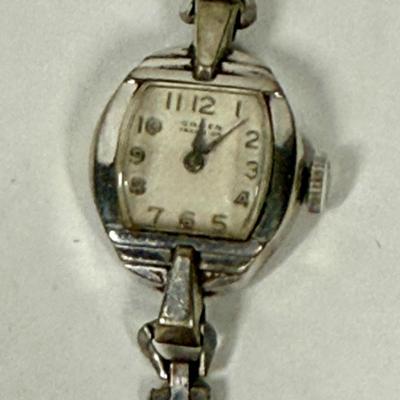 Sale Photo Thumbnail #24: Hands can be set, but watch cannot be wound.  Does not appear to be running.