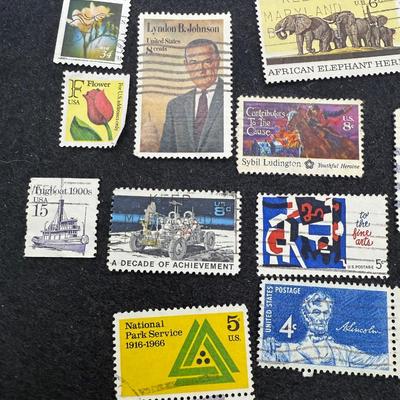 Sale Photo Thumbnail #335: Many different types and denominations. Many are used and have cancellation marks.  See photos for what’s included.