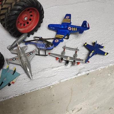 Sale Photo Thumbnail #388: Lot of vintage toy tractors and planes