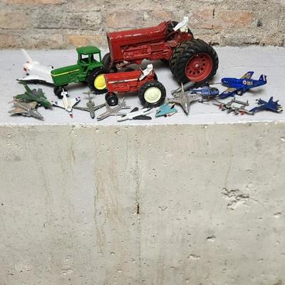 Sale Photo Thumbnail #385: Lot of vintage toy tractors and planes