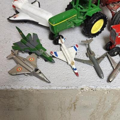 Sale Photo Thumbnail #386: Lot of vintage toy tractors and planes