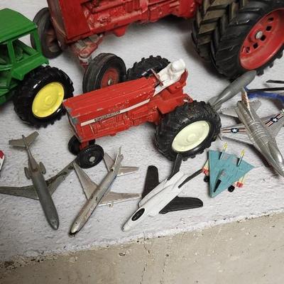 Sale Photo Thumbnail #387: Lot of vintage toy tractors and planes