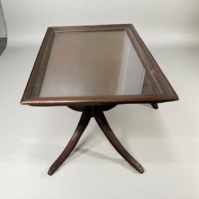 Sale Photo Thumbnail #717: Vintage Duncan Phyfe Mahogany removeable Glass Top Table.  minor scratches in the glass top
19"x28"X19"