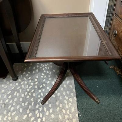 Sale Photo Thumbnail #720: Vintage Duncan Phyfe Mahogany removeable Glass Top Table.  minor scratches in the glass top
19"x28"X19"