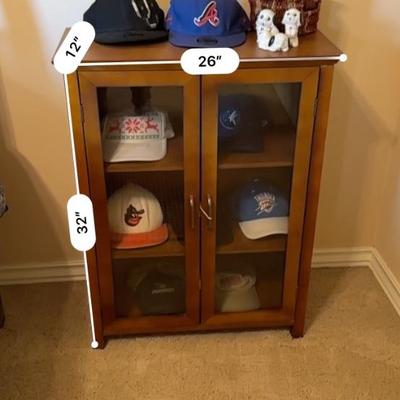 Furniture -bookshelf w/glass doors plus decor & hats