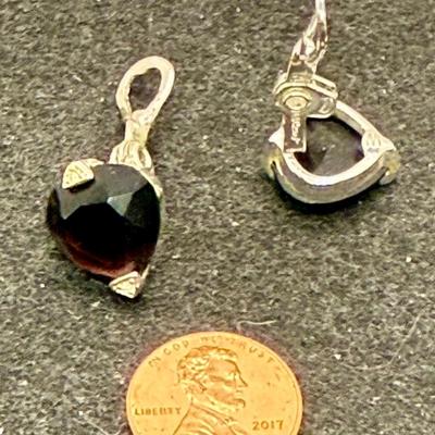 Sale Photo Thumbnail #357: Goldtone metal with garnet-red stones. Nice condition.