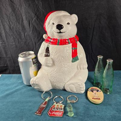 Sale Photo Thumbnail #2: This auction lot is for a large gathering of Coca-Cola items.:  Polar Bear Cookie Jar, has some minor chips around the inside rim of the lid area and looks like a red paint touch up on the head, otherwise in good used condition - dated 1996,  It measures 