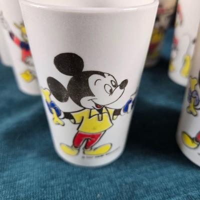 Sale Photo Thumbnail #21: This auction lot is for a Vintage 1950's Cereal Bowl and 8 Juice Glasses.  The bowl appears unused and is about 5.5-inches in diameter x 2-inches deep.  The cups may have light use but are also in very good condition, most still have their original price 