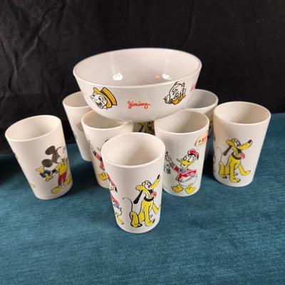 Sale Photo Thumbnail #14: This auction lot is for a Vintage 1950's Cereal Bowl and 8 Juice Glasses.  The bowl appears unused and is about 5.5-inches in diameter x 2-inches deep.  The cups may have light use but are also in very good condition, most still have their original price 