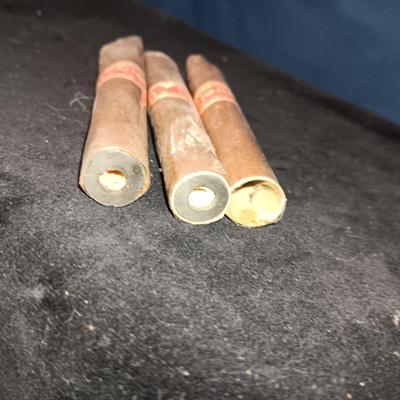 A COLLECTION OF MATCHBOOKS AND FAKE CIGARS