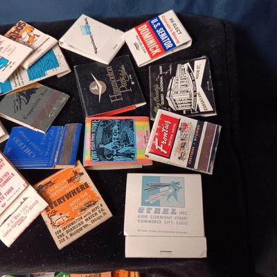 A COLLECTION OF MATCHBOOKS AND FAKE CIGARS