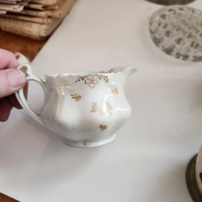 Lot of Collectable Glass Pottery , Dansk Cast Iron Candleholder Denmark, Pink Glass Parasol Candy Dish,, Old Forester Iridescent Decanters