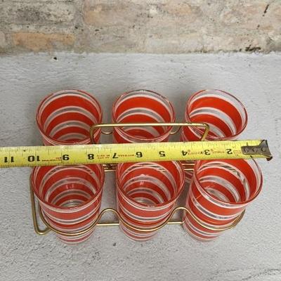 Sale Photo Thumbnail #440: Fantastic set of 6 red striped tumblers with original holder.