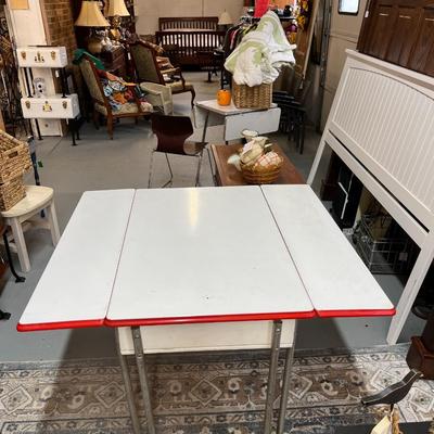 Sale Photo Thumbnail #795: Vintage Enamel Top Table with pull out leafs.  See photos for condition.