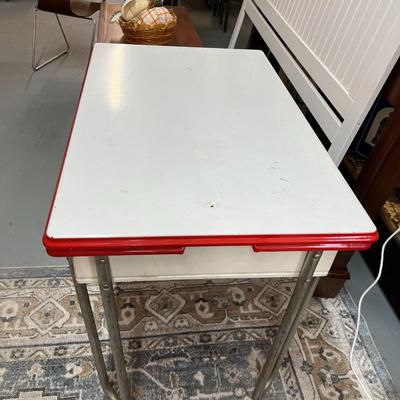 Sale Photo Thumbnail #798: Vintage Enamel Top Table with pull out leafs.  See photos for condition.