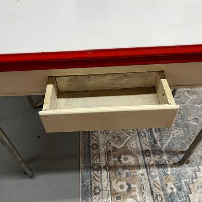 Sale Photo Thumbnail #801: Vintage Enamel Top Table with pull out leafs.  See photos for condition.